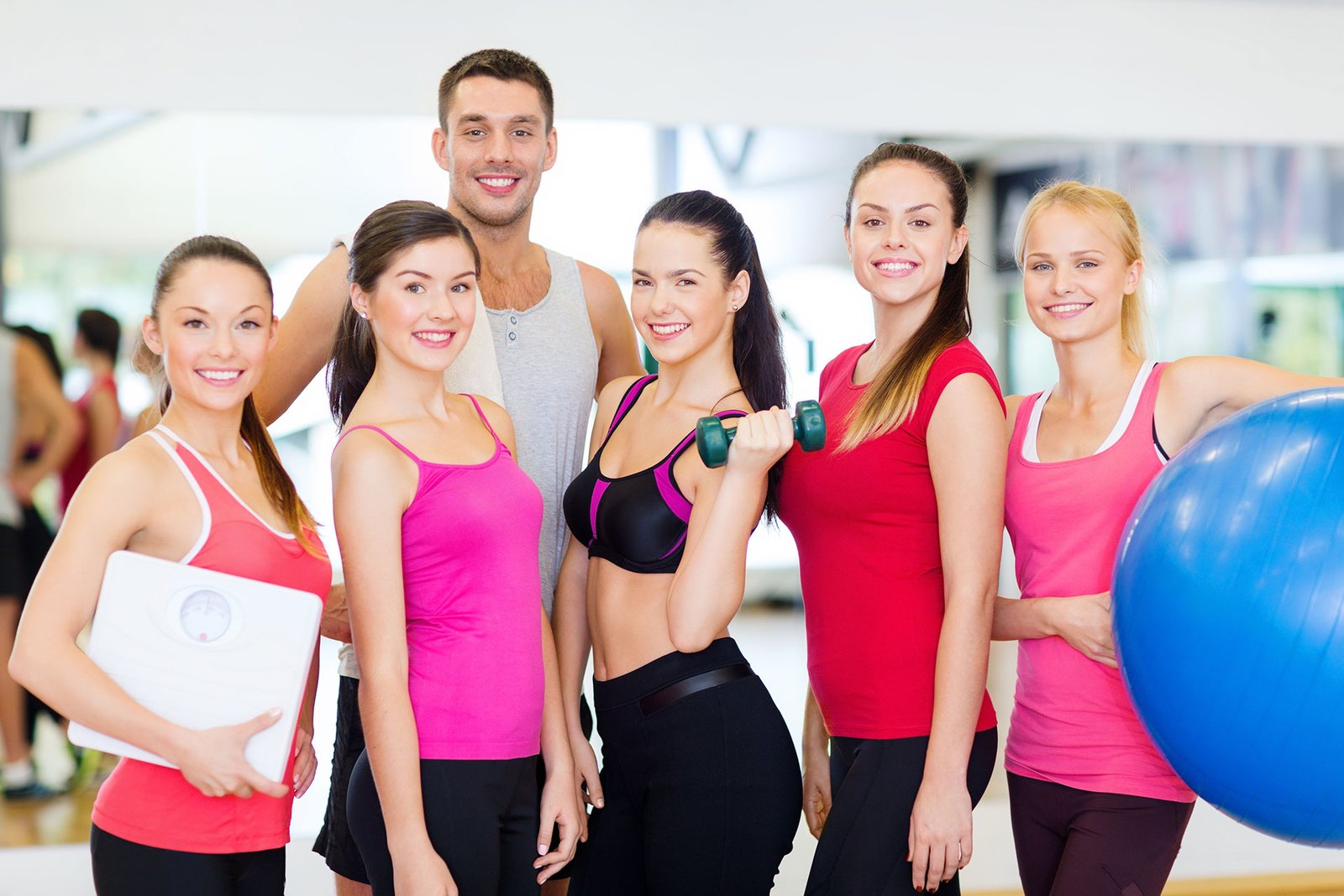 Group of fitness professionals standing together
